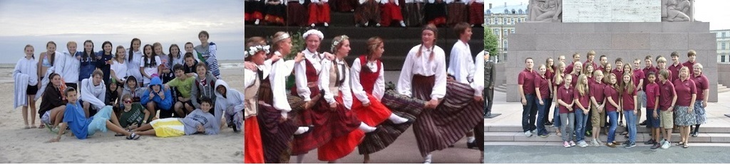 Kids posing dressed in traditional Latvian outfits